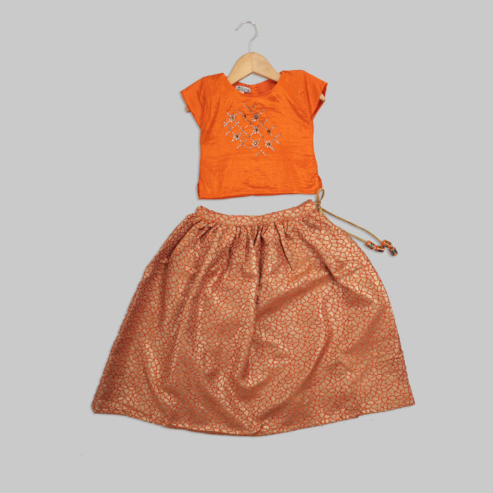 Orange Blouse with Swarovski Work and Beige Jacquard Ghaghra