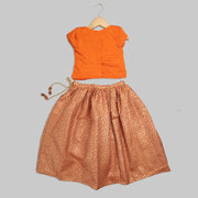 Orange Blouse with Swarovski Work and Beige Jacquard Ghaghra