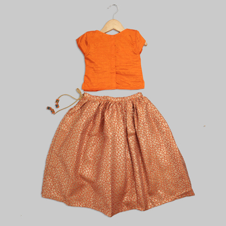 Orange Blouse with Swarovski Work and Beige Jacquard Ghaghra